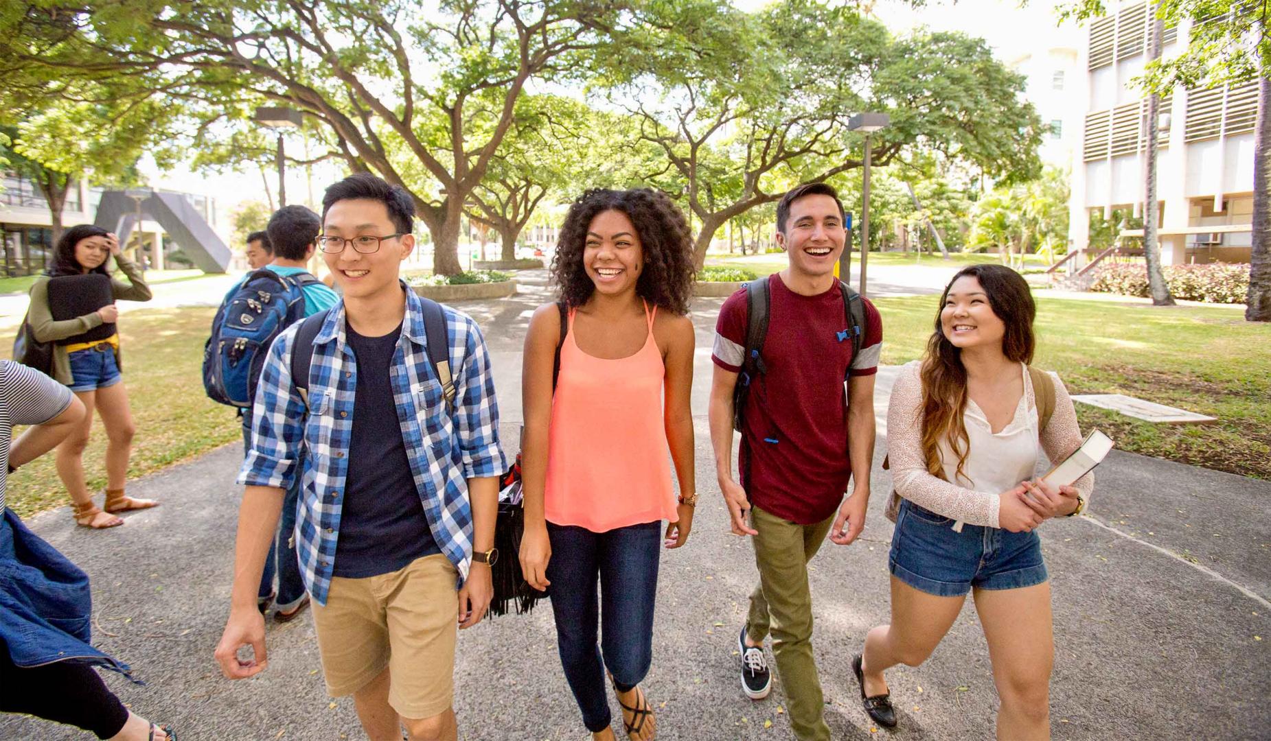 A group of people walking on the street